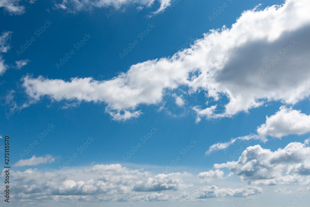 white clouds in bright blue sky white clouds in bright blue sky