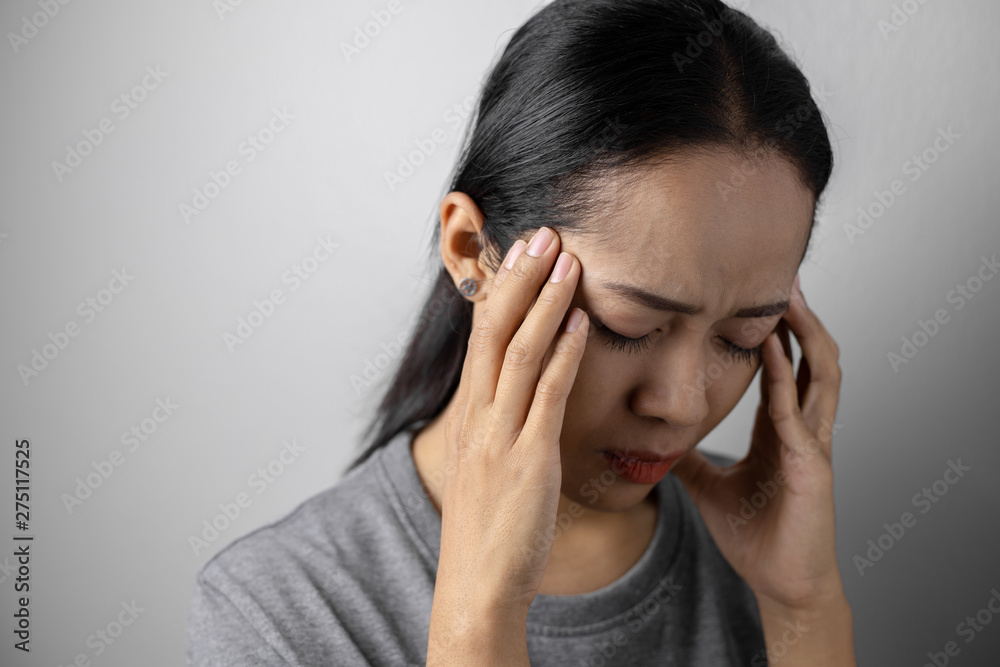 Young woman with of stress and headaches. Young woman with of stress and headaches.