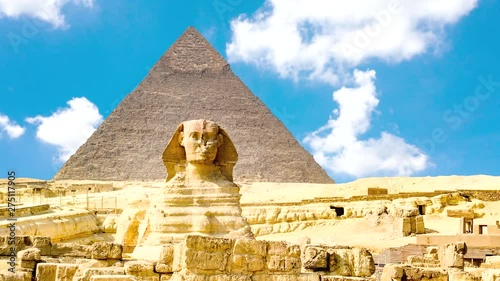 Timelapse of the famous Sphinx with great pyramids in Giza valley, Cairo, Egypt photo