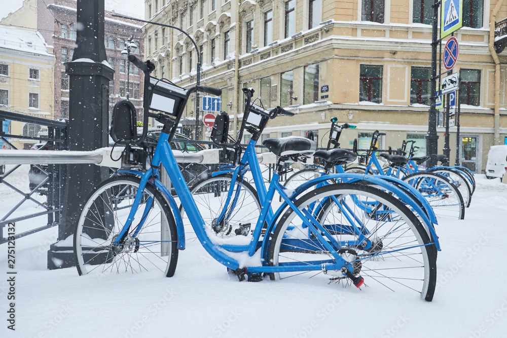 Bicycles rent station in the snow
