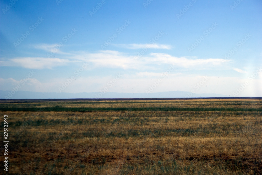 Beautiful view along the road to the lake across the steppe