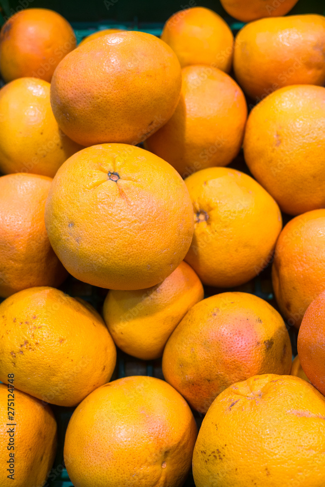 fresh juicy grapefruit on the counter of the supermarket fresh juicy grapefruit on the counter of the supermarket