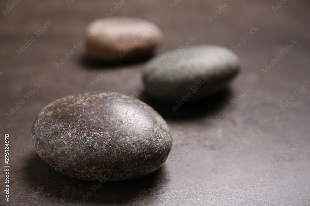 Spa stones on table. Space for text Spa stones on table. Space for text