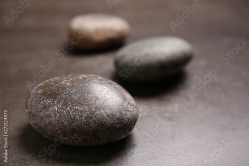 Spa stones on table. Space for text