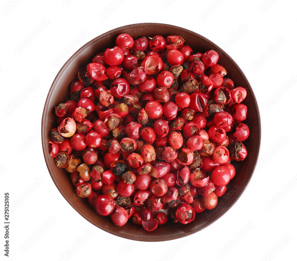 Bowl of red peppercorns isolated on white, top view Bowl of red peppercorns isolated on white, top view