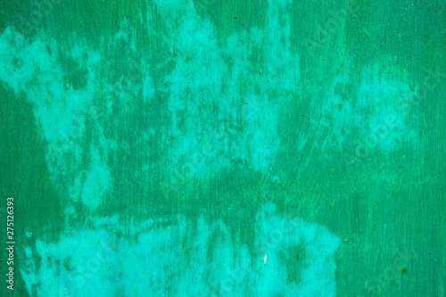 Old corroded metal wall background with flaky green paint .Rusty flaky cracked metal surface.Abstract the surface texture of the old metal. © Subcomandantemarcos