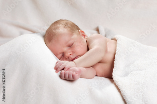 healthy newborn baby two week old sleeping