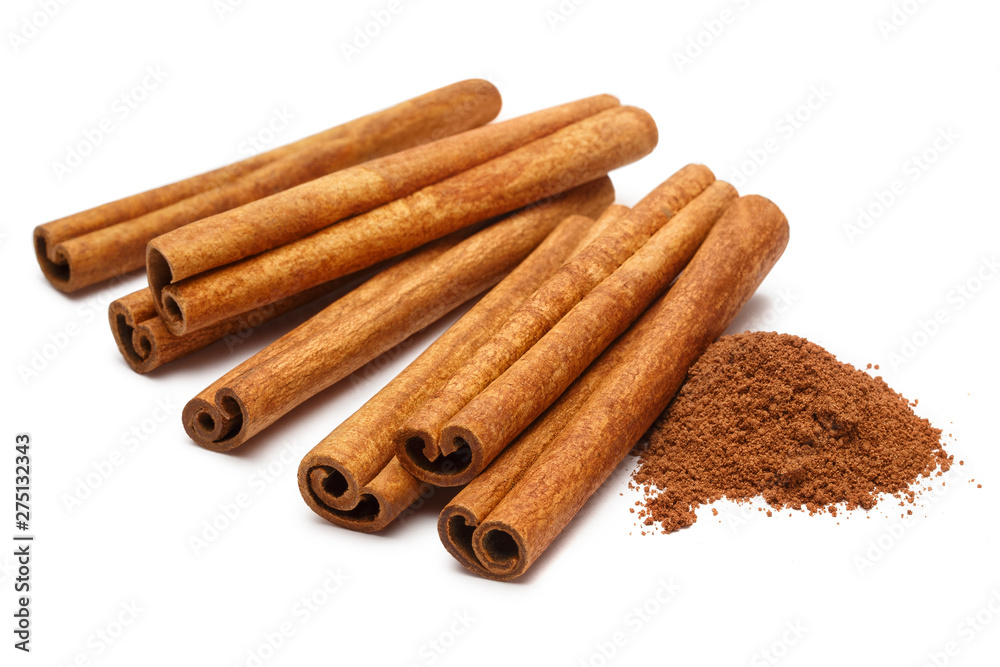 Cinnamon sticks and powder, isolated on white background