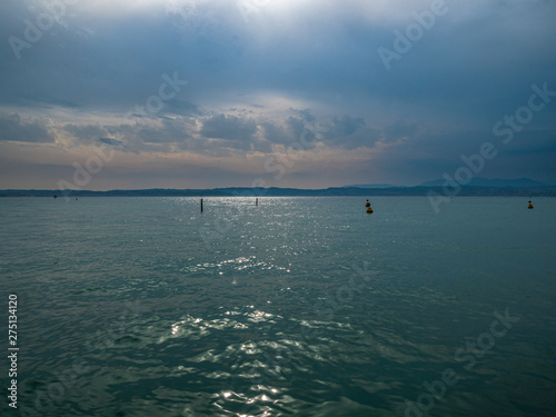 Lake Gardasee Water view during Summer vacation time with a mediterranean feeling