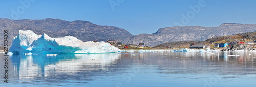 Abandoned fishing village, landscape Greenland, beautiful Nuuk fjord, ocean, iceberg with mountains background