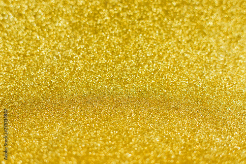 Bright sparkle golden background. Holiday and festive concept.