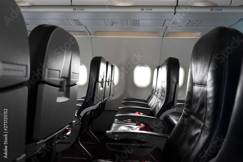 Row of seat in airplane.