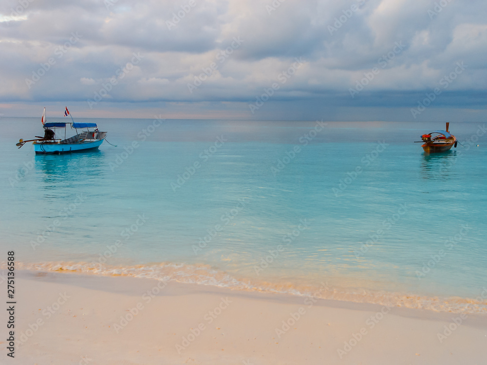 Morning Long Tail Boats for Transportation Travel Tourist Diving Around Vacations in Tropical of Asian Summer or Spring Holidays at Thailand.