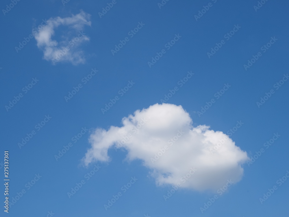 Cloudy sky background, view of fat white clouds moving in blue sky background. Cloudy sky background, view of fat white clouds moving in blue sky background.