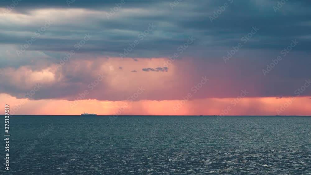 Sunset sky over sea water at horizon. Evening sun light ocean landscape. Sunset sky over sea water at horizon. Evening sun light ocean landscape.