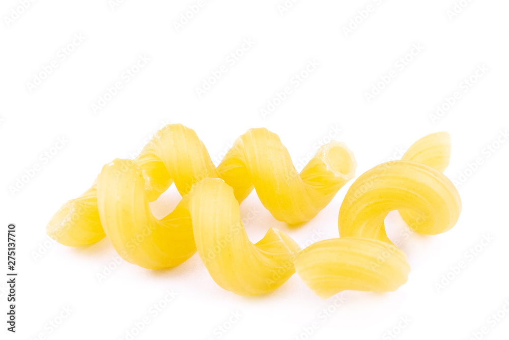 Cellentani pasta on white background