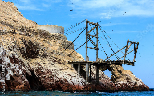 Old wood dock in Ballestas Islands, Peru