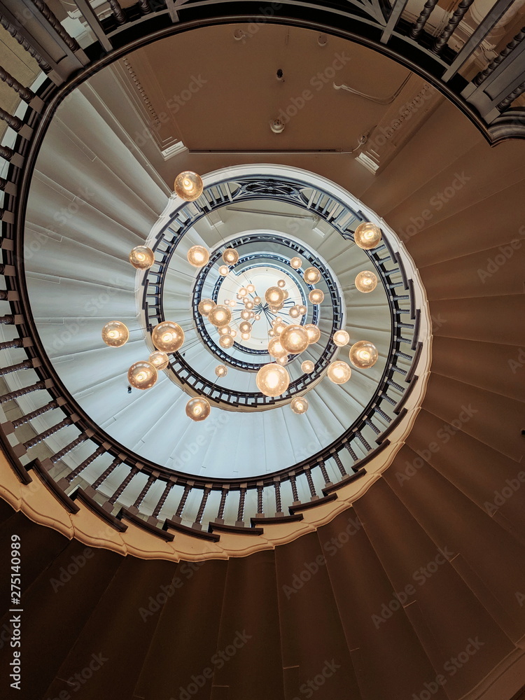 Fototapeta premium Spiral staircase with lights