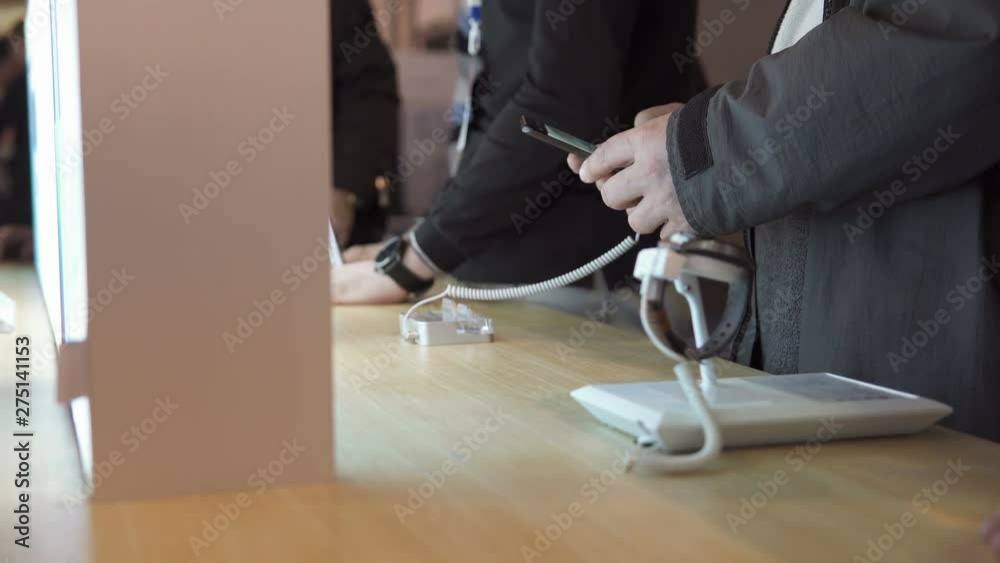 Buying a smartphone and smart watches in the store