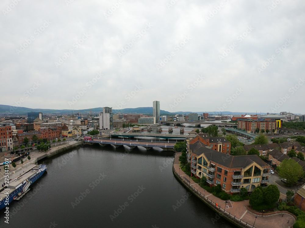 Fototapeta premium aerial view on river and bridge in belfast northern ireland. beautiful landscape by city view from above