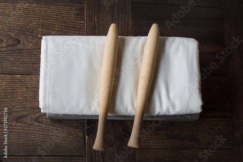 Korean ironing tool, dadumee which consists of dadumee stone and two dadumee bats.