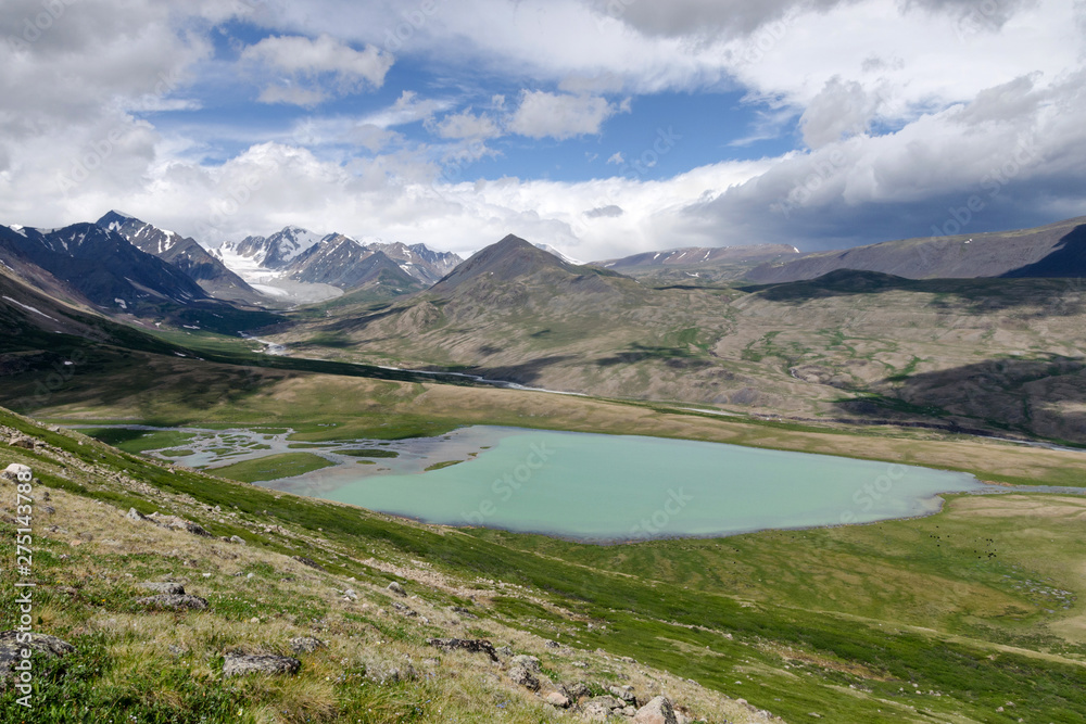 Western Mongolia mountainous landscape. Alpine lake. Altai Tavan Bogd National Park, Bayan-Ulgii Province, Mongolia.