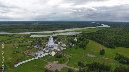 Flying over Monastery in North. Flight over the Russian Orthodox monastery in the North of Russia on the banks of the river