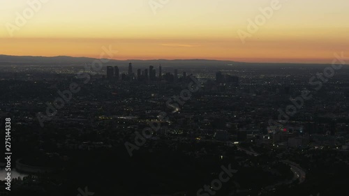 Aerial sunrise view central Los Angeles city lights