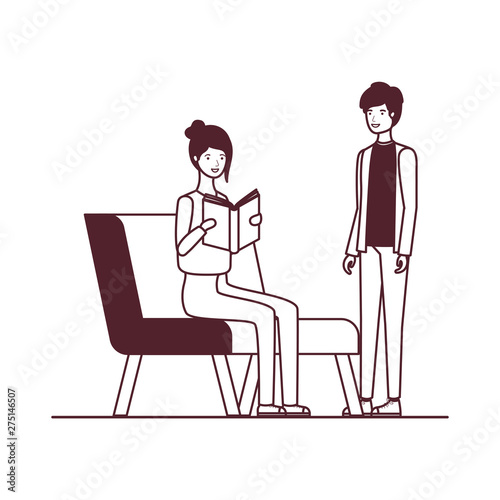 silhouette of couple sitting on chair with book in hands