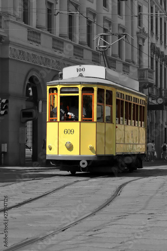 tram giallo a milano in italia, yellow streetcar in the downtown of milan city in italy 