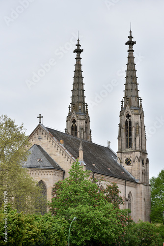 Beautiful and tall towers on evangelical church in Europe against the sky, Germany