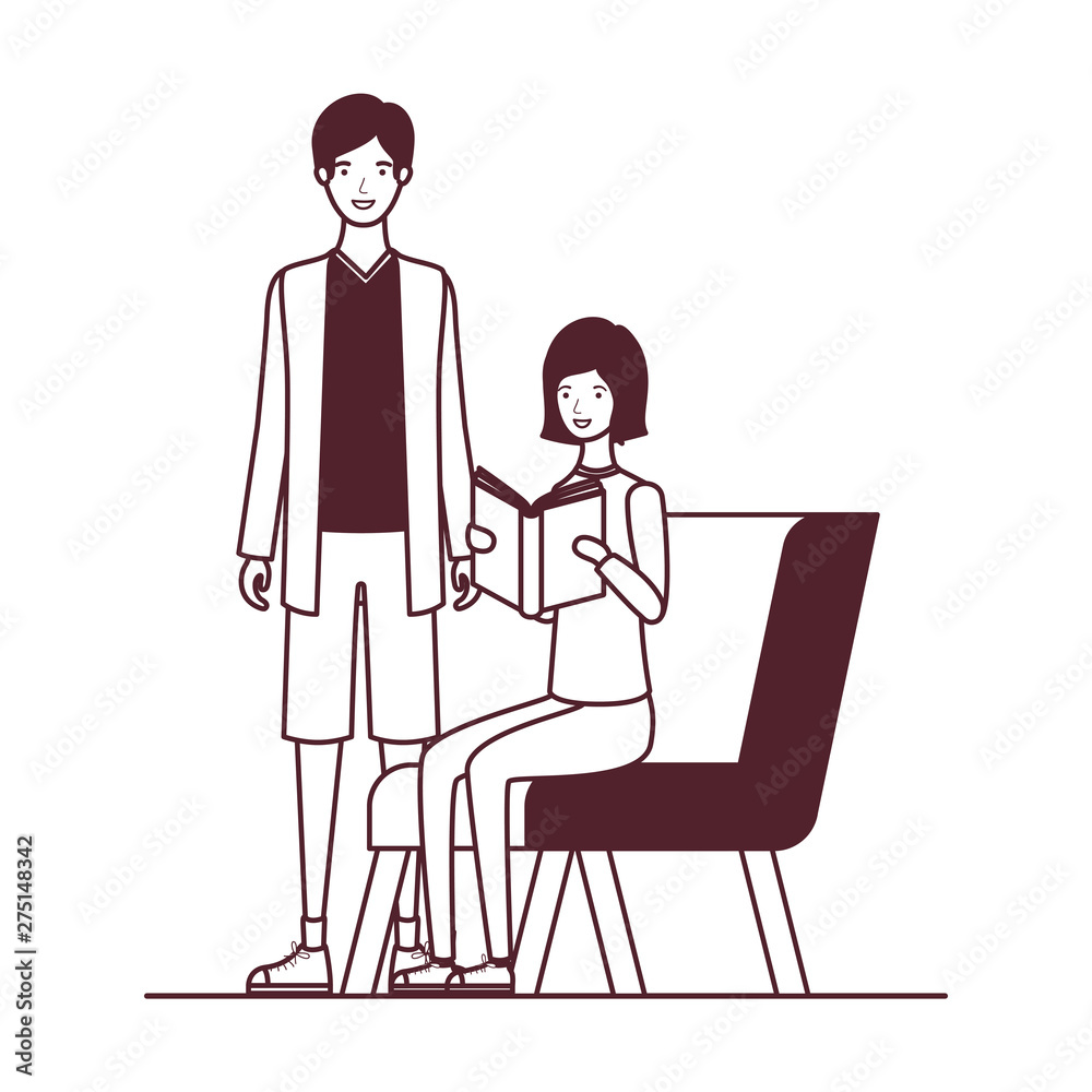 silhouette of couple sitting on chair with book in hands