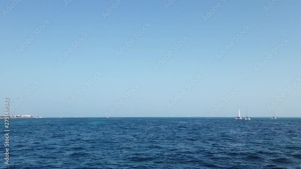 Blue sky and sea in a tropical beach. Blue sky and sea in a tropical beach.