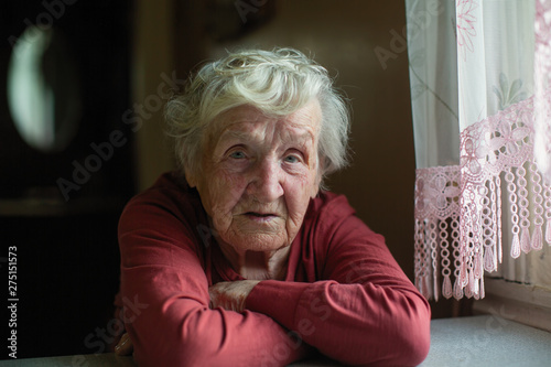 Closeup portrait of elderly woman..Russian old-age pensioner.