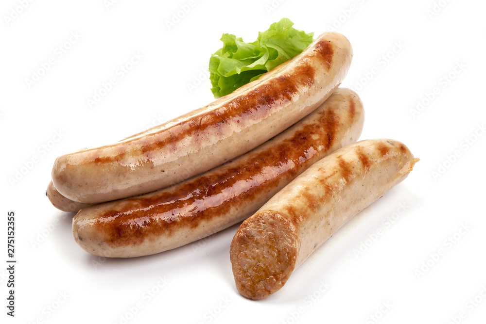 Grilled German white sausages, Thuringer Rostbratwurst, close-up, isolated on white background Grilled German white sausages, Thuringer Rostbratwurst, close-up, isolated on white background