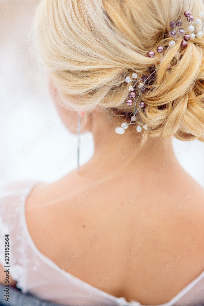 Bride hairstyle, bride dress up at home in a pink robe