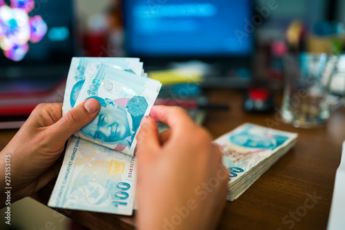 Fototapeta Naklejka Na Ścianę i Meble -  woman hands counting turkish lira