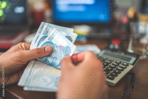 woman hands counting turkish lira