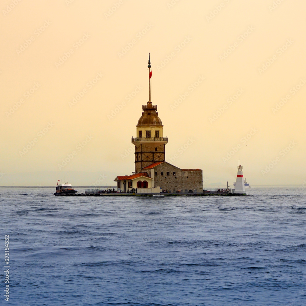 the Kiz Kulesi Lighthouse in the Strait of Istanbul at sunset