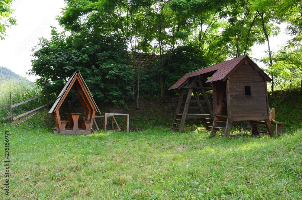 Obraz premium wooden houses on the lake shore
