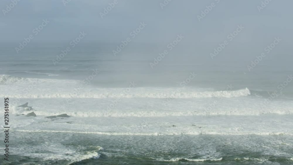 Aerial waves on surface Pacific Ocean Mavericks USA Aerial waves on surface Pacific Ocean Mavericks USA