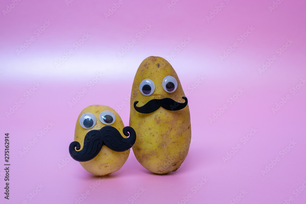 funny potato head with face on pink background