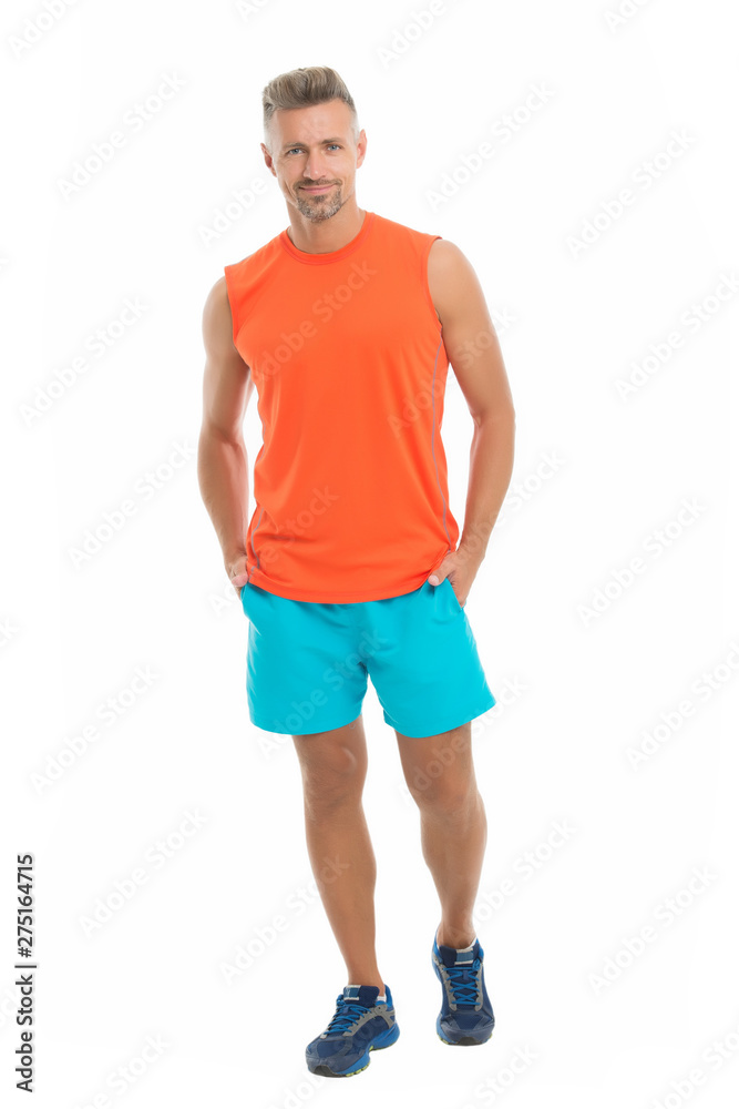 Guy sport outfit. Fashion concept. Man model clothes shop. Sport style.  Menswear and fashionable clothing. Man calm face posing confidently white  background. Man handsome in shirt and shorts Stock Photo