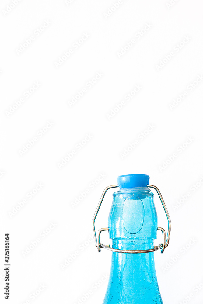 BLUE CRYSTAL BOTTLE ON WHITE BACKGROUND BLUE CRYSTAL BOTTLE ON WHITE BACKGROUND