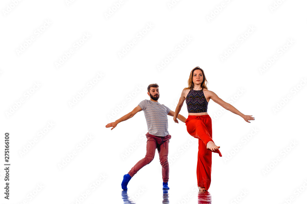 Sweet couple dancing social dance, isolated on white Sweet couple dancing social dance, isolated on white