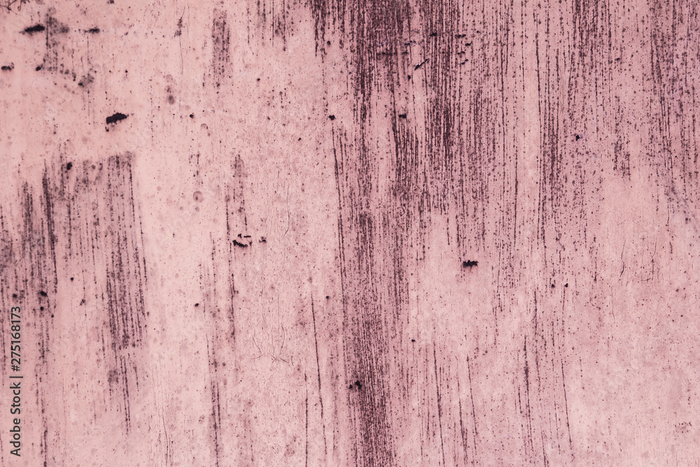 Old , rusty iron with paint residue. Pink background. Abstract color textures. Cracked texture.