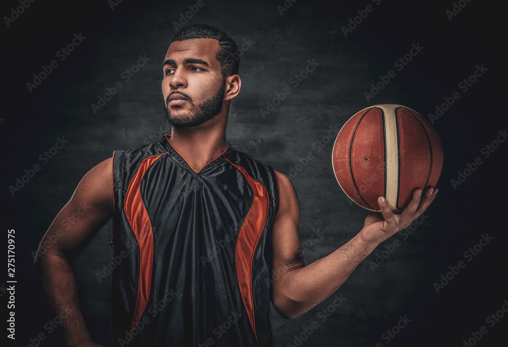 Portrait of a bearded black man holds a basket ball. Portrait of a bearded black man holds a basket ball.