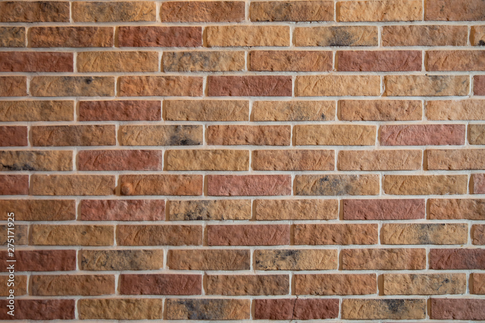 Obraz premium Modern brick wall, brown brick wall textur for background . New multi-colored brick wall. texture background.