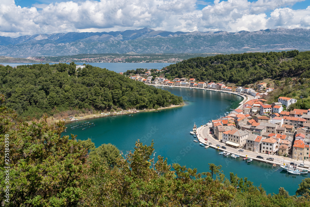Colorful old village of Novigrad in Istria county of Croatia with blue river and harbor