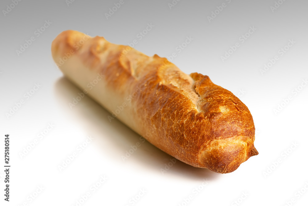 Fresh French baguette with a crispy crust on a light background